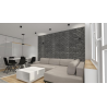 Cegła gipsowa ułożona w pokoju dziennym, salonie w stylu loft od Petraart