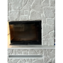 Kamień szary dekoracyjny. Przykład ułożenia na kominku.